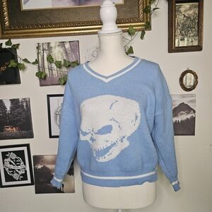 Blue Sweater with White Skull Design